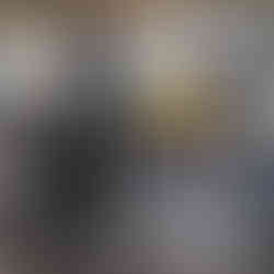 A custom motorcycle with a yellow gas tank