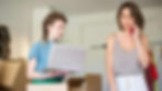 two-girls-unpacking-screen-printed-clothing