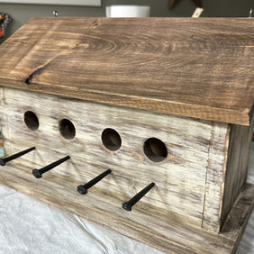 Handcrafted Rustic Birdhouse with 3 (or 4) holes and wrought-iron perches, perfect for inviting nature into your backyard. Requires nail gun, drill press, and drill for construction.