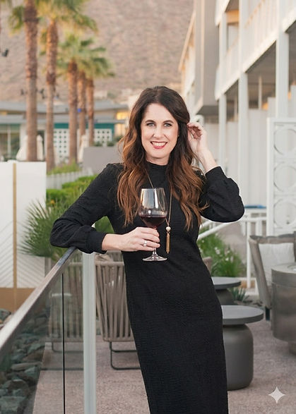 Me holding a wine glass.jpg