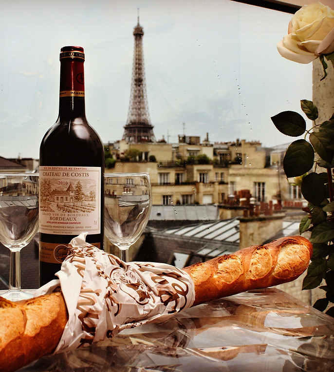 glass of wine and the Eiffel Tower