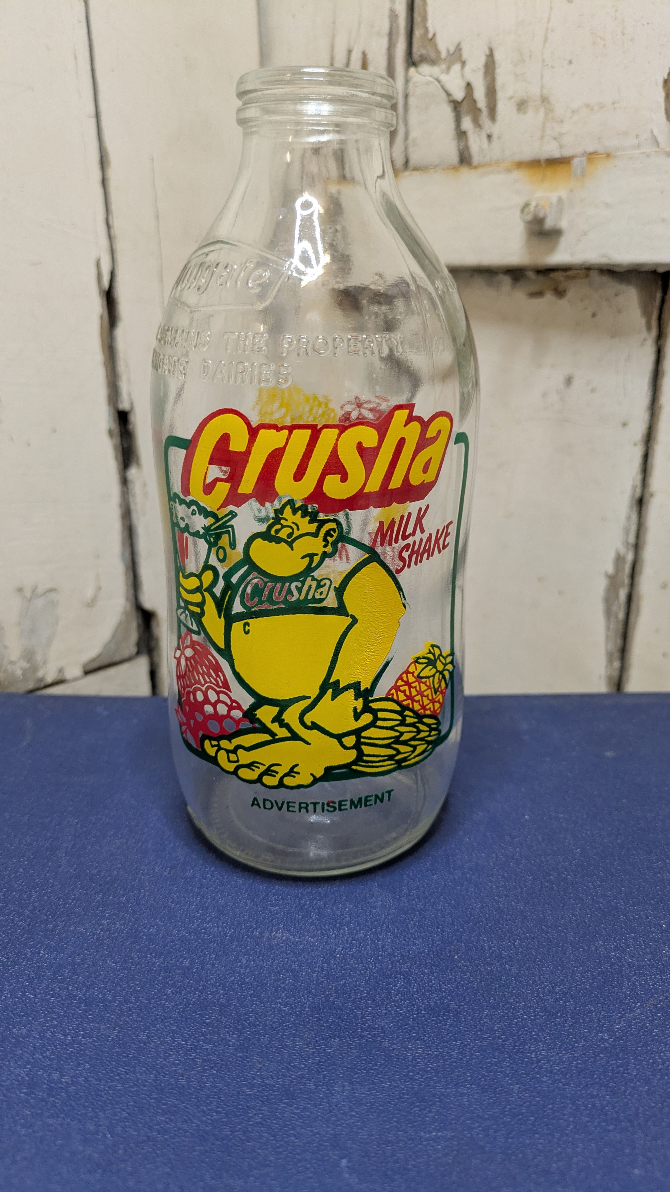 Vintage 1 pint Unigate advertising milk bottle - Crusha