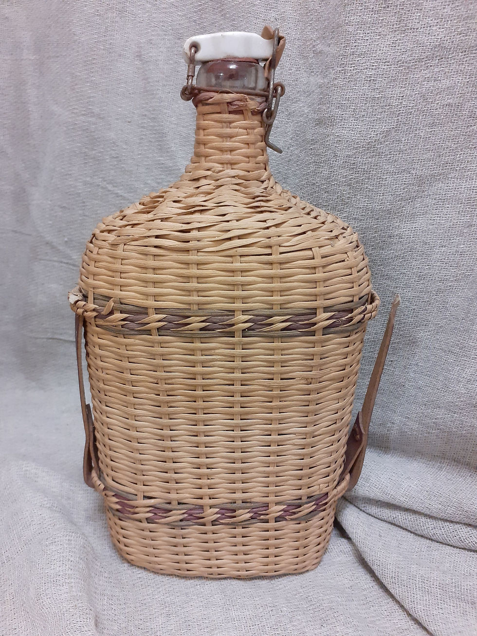 Thumbnail: Vintage raffia covered bottle
