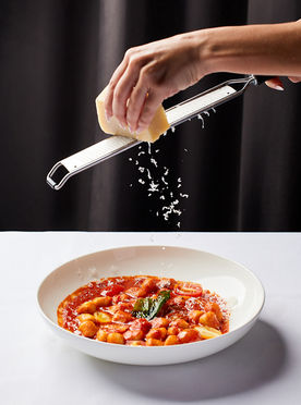 Levitating famous food photographer pasta dark mood mozarella