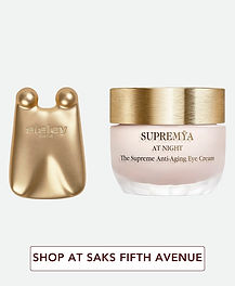 Sisley Supremÿa At Night anti-aging eye cream with gold massage tool for overnight eye-contour care, fine lines, puffiness and dark circles.