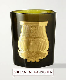 Trudon Spiritus Sancti scented candle in dark green hand-blown glass with gold emblem, featuring incense, lily of the valley, benzoin and labdanum notes.