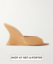 Aquazzura Bisous 95 suede wedge sandals in camel beige with open almond toe, sculptural wedge heel and slip-on mule shape for chic night-out styling.