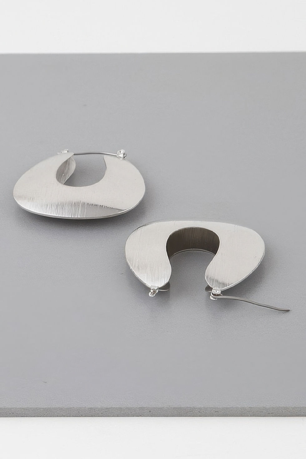 Thumbnail: Hollow Arch Hoop Earrings