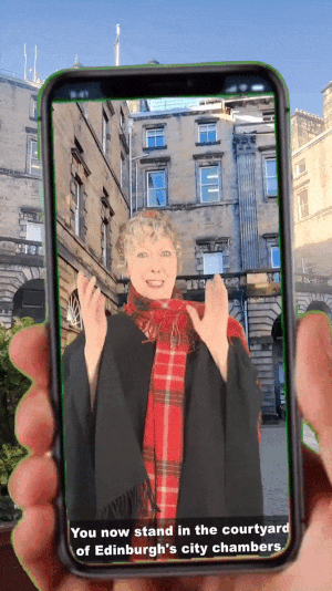 An Edinburgh tour guide on a smartphone