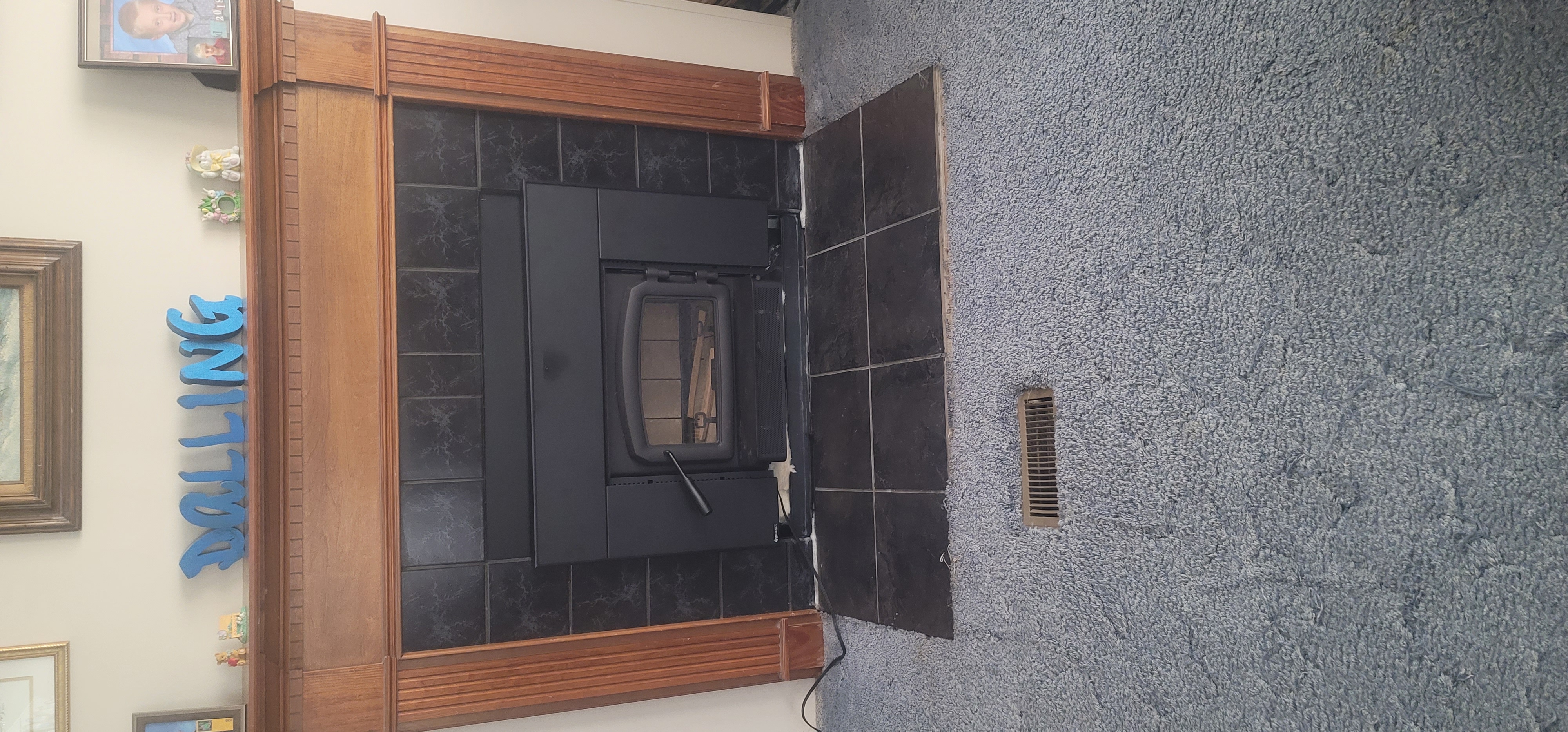 Regency wood-burning insert installed in a fireplace by Idaho Chimney Life