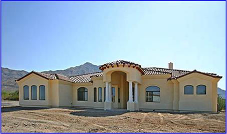custom home with unique column front entrance