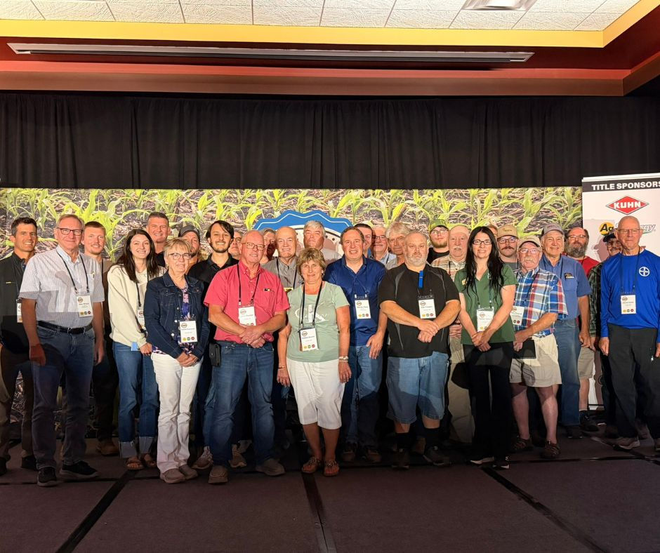Southeast Minnesota farmers and agricultural professionals gathered for a group photo during the 2026 National Strip-Till Conference in Springfield, Illinois. The group traveled together as part of the Southeast MN Soil Health Bus Tour, a three-day educational and networking experience focused on soil health, strip-till and innovative agricultural practices.