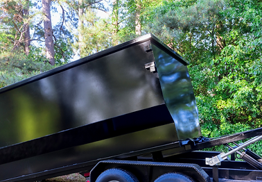 Roll off dumpster coming off the truck