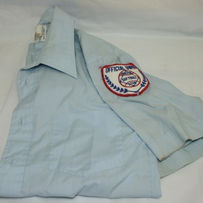 light blue button shirt with patch