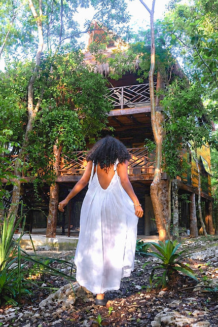 woman walking in jungle garden