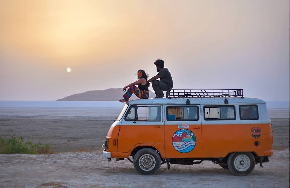 On the top of your caravan along with rising sun.