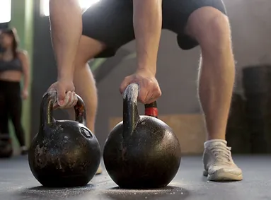 Lifting Kettlebells.webp