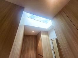 Walk in Robe WIR to Hilltop house ensuite with skylight in Canberra Hyperspace Architects