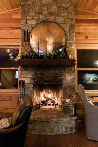 cabin direct shot of fireplace w chairs.jpg