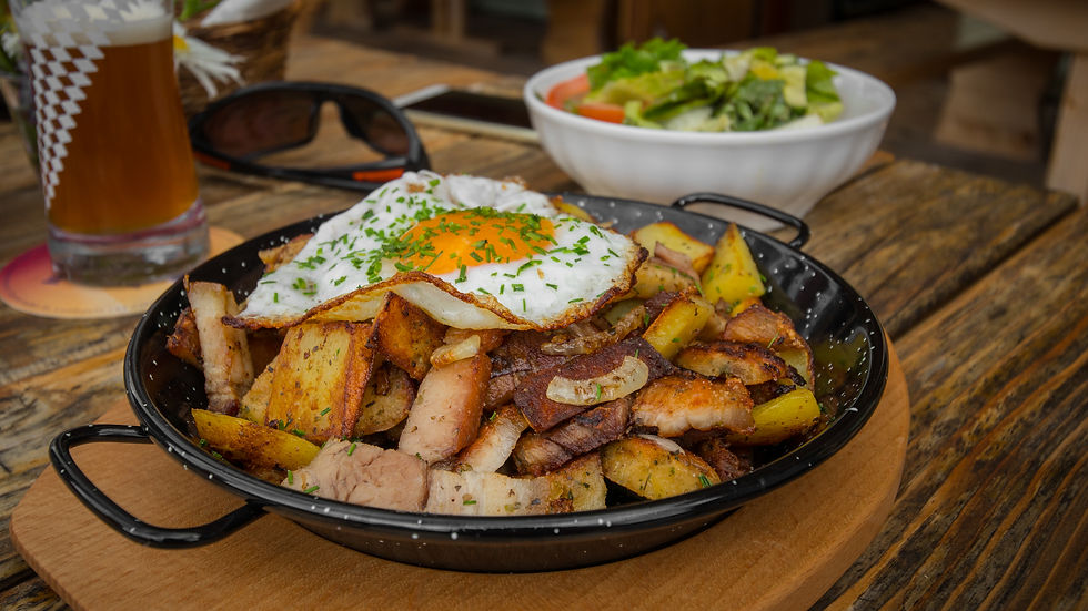 Tiroler Gröstl, a hearty skillet of potatoes, onions, and meat.