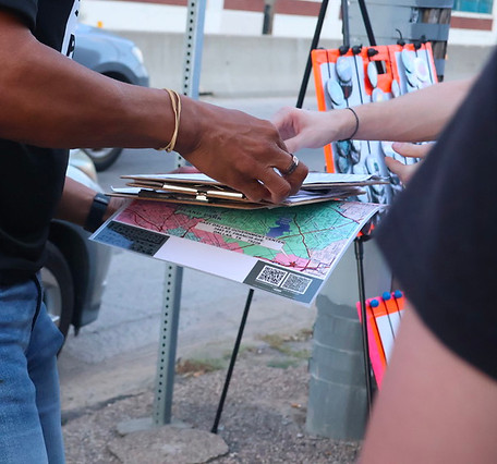 A local coffee company, Pax and Beneficia Coffee, hands out raffles.jpg
