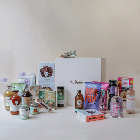 Luxury hamper packaging and visual identity for KaDeWe, showcasing premium gourmet delicacies. Design by Christina Nath.