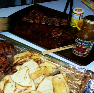 Grilled Ribs, garlic bread & steaks