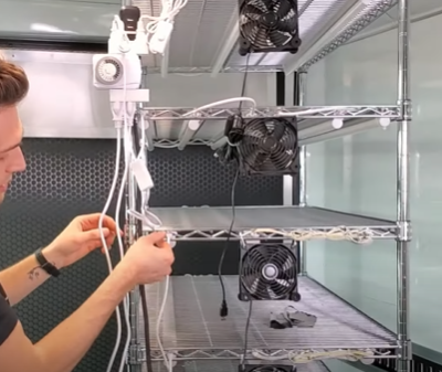 Cj Vaughn of On The Grow doing Cable Management for the Professional Microgreens Grow Rack