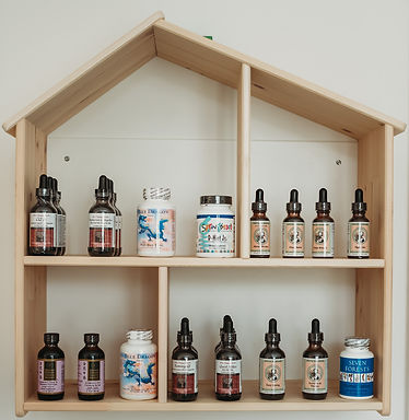 Chinese herbal tinctures for kids in wooden house