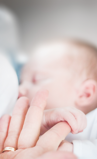 tilt-shift-lens-photo-of-infant-s-hand-h
