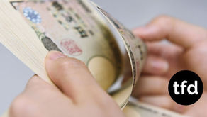 Yen Slumps After BOJ Raises Rates as Expected