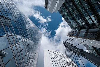 Commercial Real Estate with upward view of tall buildings