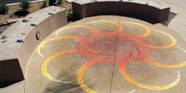 Example: Mosaic set in concrete surround with seat walls