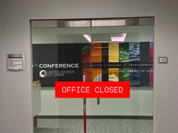 Front entrance of HCUCC office. Added text across doors reads "OFFICE CLOSED" in red.