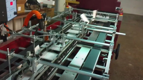 Moll Vantage 720 In-Line System w/ Creasing and Fugitive Glue - 6 Page Mailer running at 30K an hour
