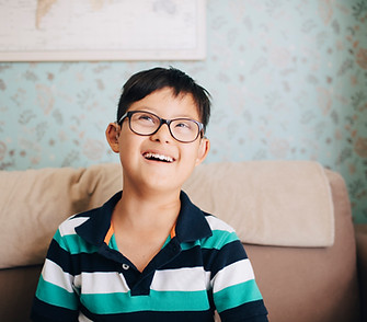 Portrait of a Boy with Glasses
