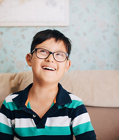 Portrait of a Boy with Glasses