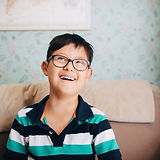 Portrait of a Boy with Glasses