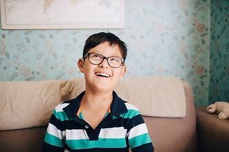 Portrait of a Boy with Glasses