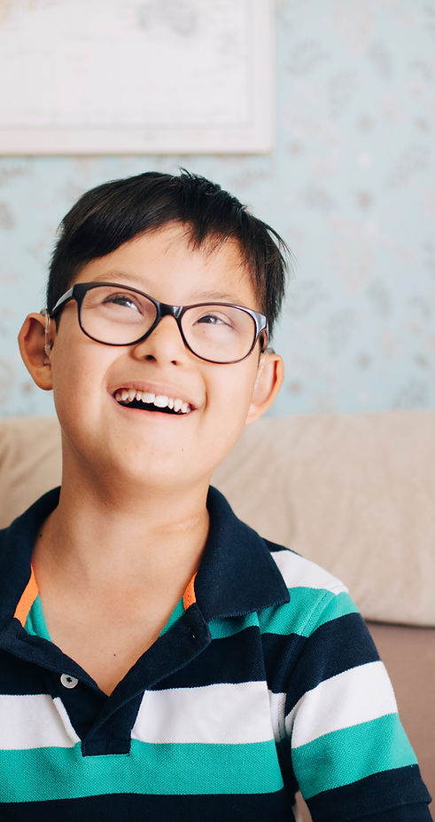 Portrait of a Boy with Glasses