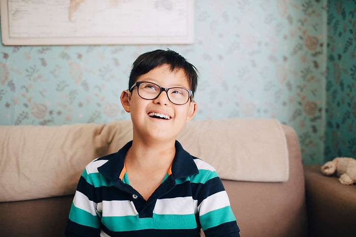 Portrait of a Boy with Glasses
