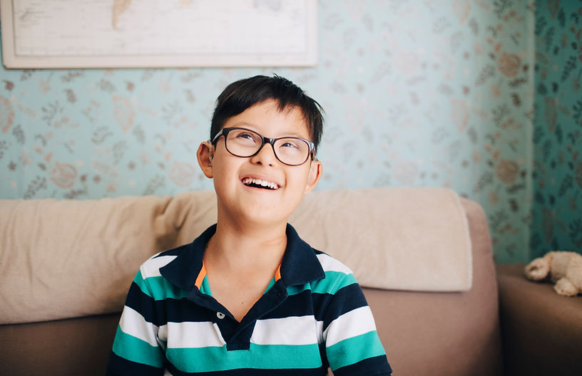 Portrait of a Boy with Glasses