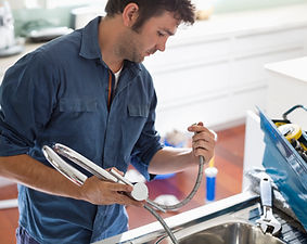 Man Fixing Sink