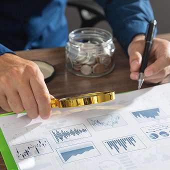 Analyzing financial documents with magnifying glass