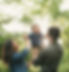 Mom and Dad are playing with their child.