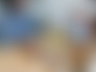 Parent and child eating together at table during mealtime, demonstrating family connection and tiny habits for autism support