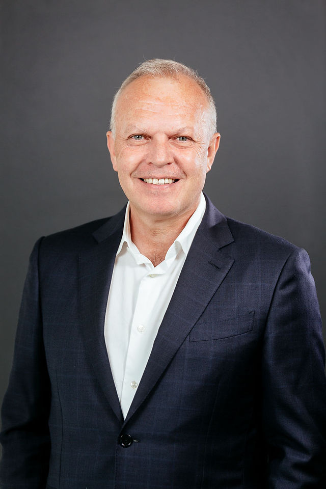 Sydney corporate headshot photographer capturing senior male executive for business profile
