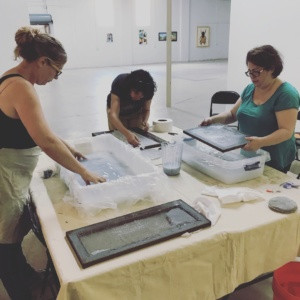 Three students making paper, handmade paper, art class Charlotte NC