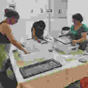 Three students making paper, handmade paper, art class Charlotte NC