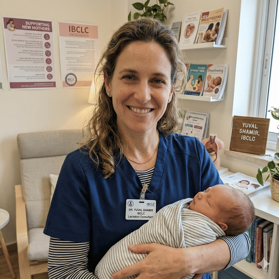 Dr. Yuval Shamir IBCLC lactation consultant holding newborn in clinic